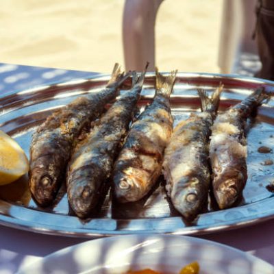 Typical dish of the Costa del Sol, in Estepona, Málaga, Andalucia, Spain.  Grilled sardines  It's called Espeto